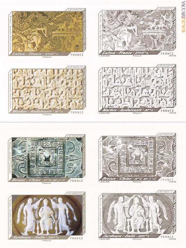 Otto dei dodici francobolli riproducenti opere d'arte e stampati nei due sistemi