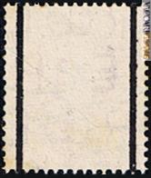 Un francobollo del Regno Unito con, al retro, le barre di grafite per il riconoscimento
