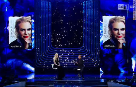 Sanremo - L’attrice Nicole Kidman, il conduttore Carlo Conti ed ai lati il francobollo