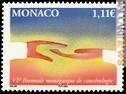 La mano è un tipico tema di Folon; qui è ripreso da un francobollo di Monaco uscito nel 2004