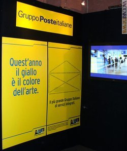 La mostra di Roma ha tra i partner Poste italiane, come testimonia l’area dedicata