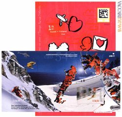 Due dei foglietti in uscita: in quello rosso dedicato agli innamorati si vede, in alto a destra, il quadrato giallo e nero con l'«upcode»; in primo piano, il blocco in movimento riguardante lo sci alpino