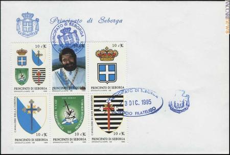 Una busta con alcuni dei “francobolli” targati Seborga e cachet dell'“ufficio filatelico”; uno offre l'immagine giovanile di Giorgio I, alias Giorgio Carbone (collezione Fabio Vaccarezza)